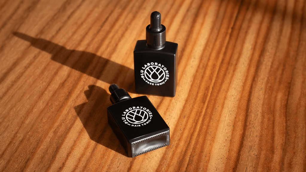 PLU Face and Hair Tonic on Wood